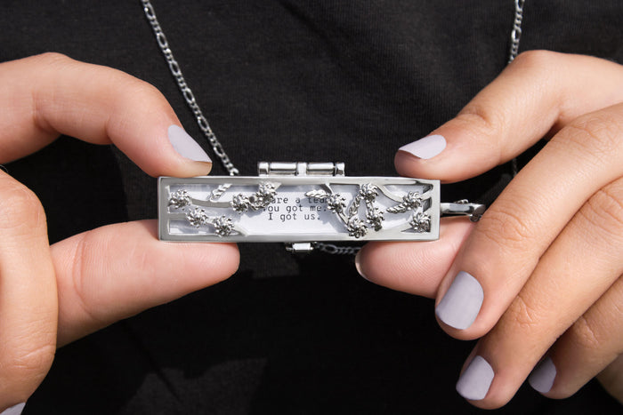 Shown here: Our Flowered Vines Fortune Locket, a meaningful personalized anniversary gift